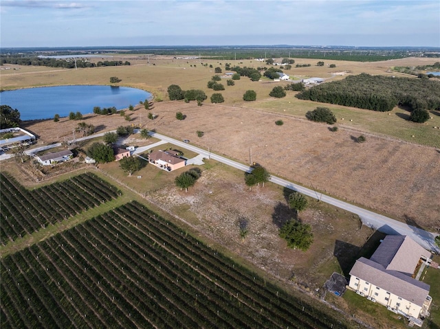 bird's eye view with a rural view and a water view