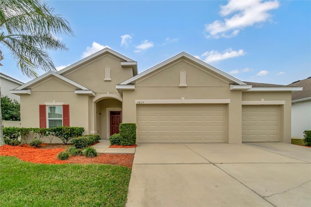 view of front of home with a garage