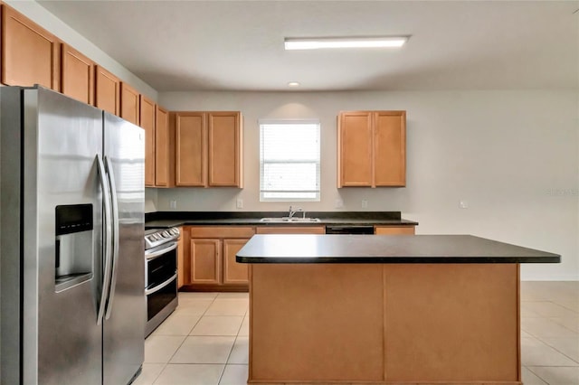 kitchen featuring light tile patterned flooring, sink, a kitchen island, and stainless steel appliances