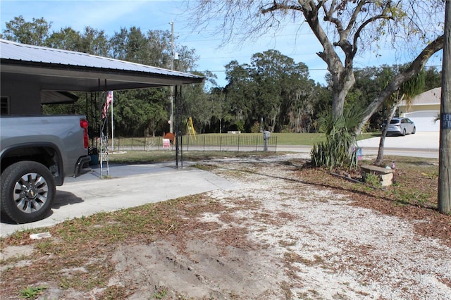 view of yard featuring a carport