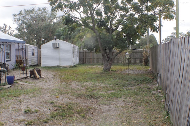 view of yard with a storage shed