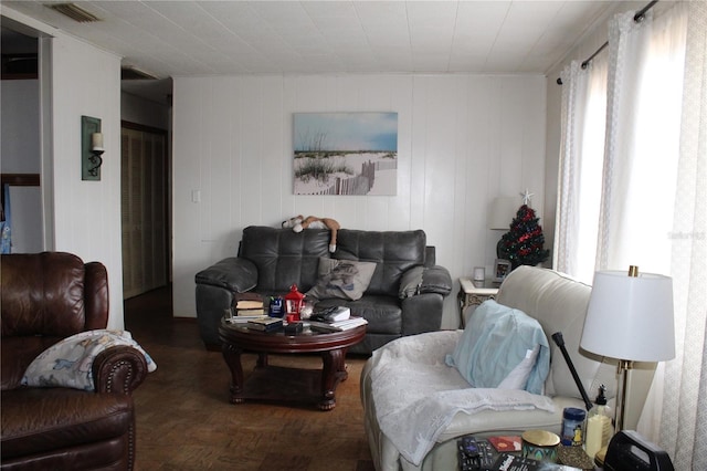 living room with dark parquet flooring