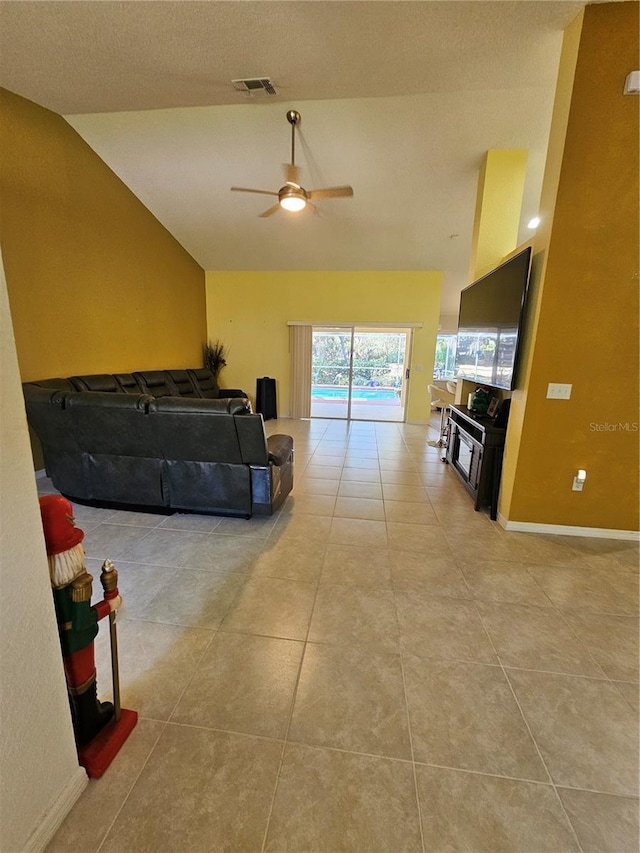 1072 Old Cutler Rd, Lake Wales, FL 33898 - living area featuring a ceiling fan, light tile patterned floors, and high vaulted ceiling