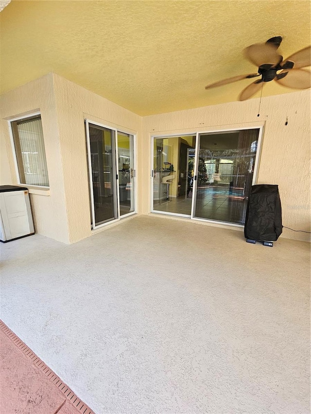 view of patio / terrace with ceiling fan