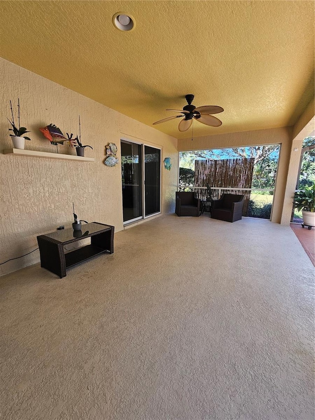 view of patio with ceiling fan and an outdoor hangout area