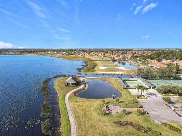 bird's eye view with a water view