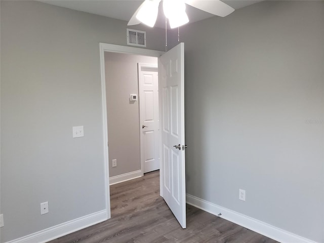 unfurnished room featuring hardwood / wood-style flooring and ceiling fan