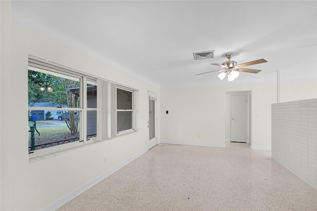 spare room featuring ceiling fan