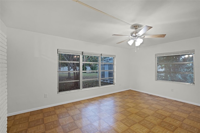 1891 18th St NW, Winter Haven, FL 33881 - unfurnished room featuring ceiling fan and baseboards