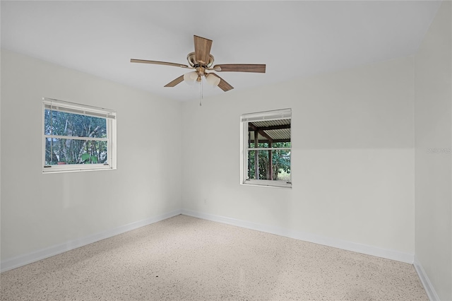 spare room featuring ceiling fan