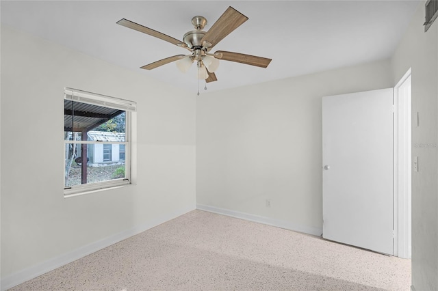 unfurnished room featuring ceiling fan