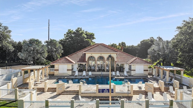 view of swimming pool featuring a patio