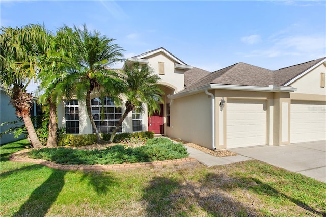 view of front of property with a garage