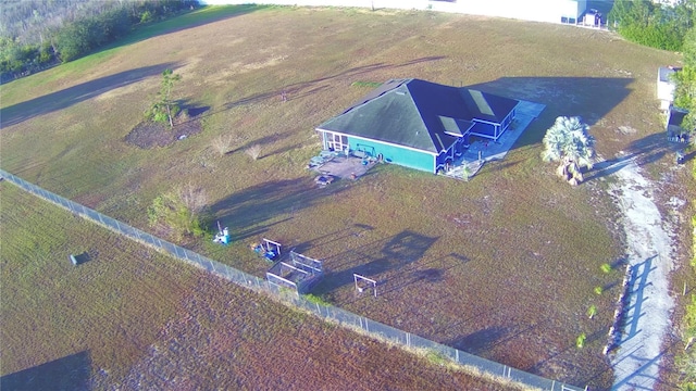 birds eye view of property featuring a rural view