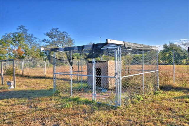 view of yard with an outdoor structure