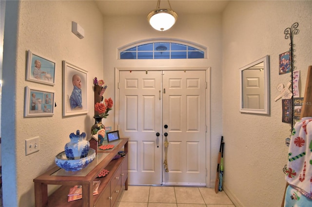 view of tiled entrance foyer