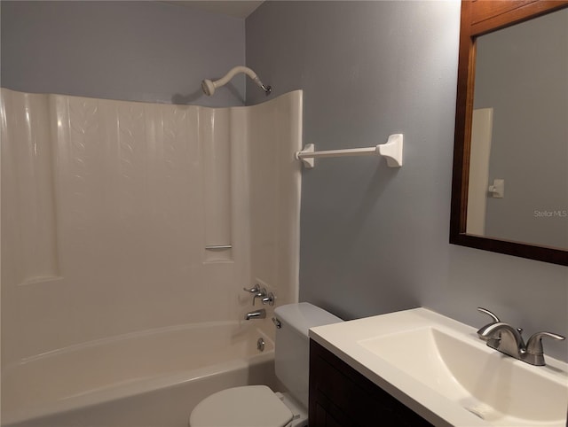 bathroom with  shower combination, vanity, and toilet