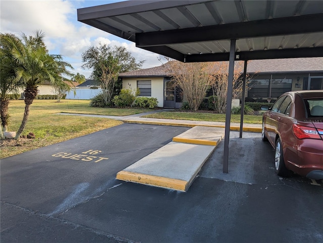 view of partially covered parking lot