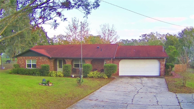 ranch-style house with a front lawn and a garage