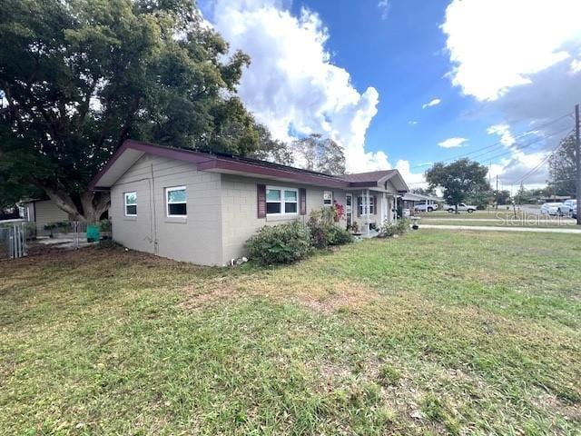 exterior space with a front yard