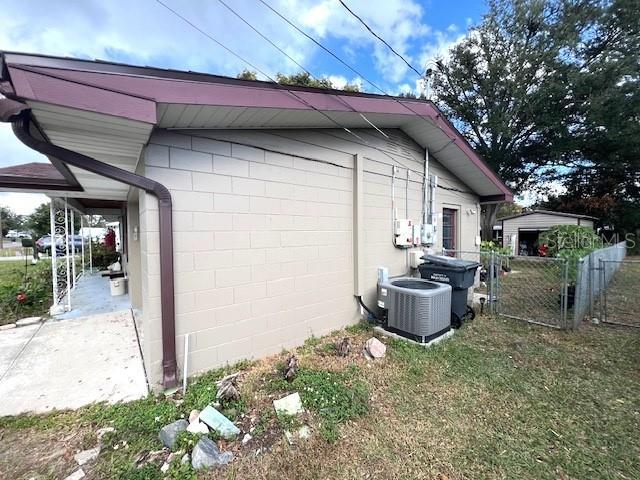 view of home's exterior with cooling unit