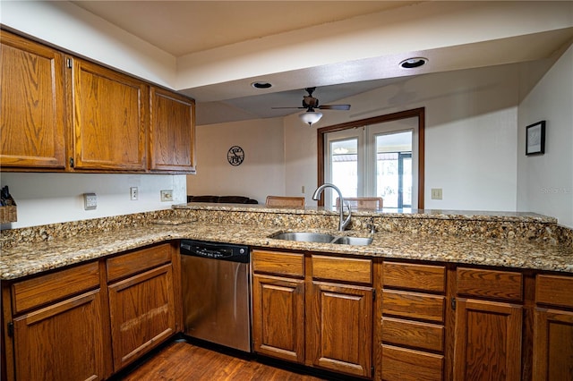 kitchen featuring kitchen peninsula, ceiling fan, sink, dishwasher, and dark hardwood / wood-style floors