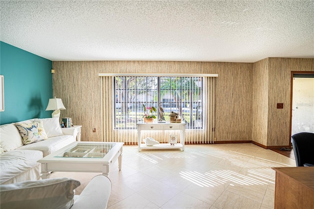 living room featuring a textured ceiling