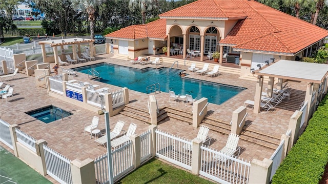 view of pool featuring a pergola, a patio area, and a community hot tub