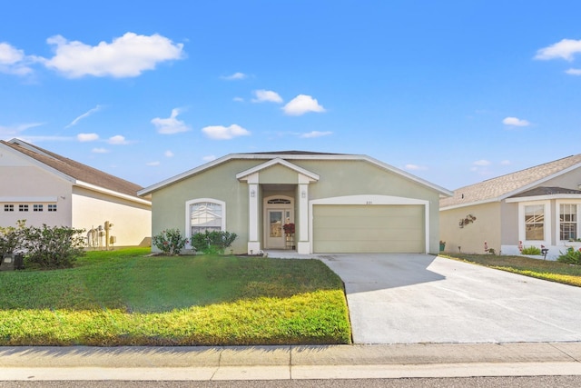 ranch-style house featuring a front yard and a garage