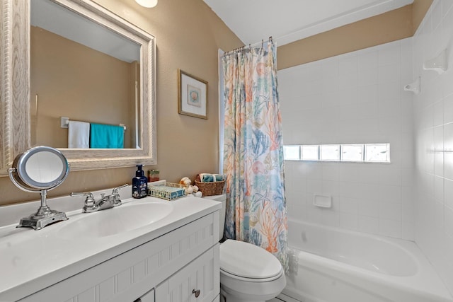 full bathroom featuring vanity, shower / tub combo, and toilet