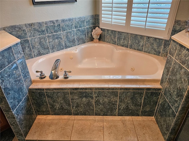 bathroom with tiled bath