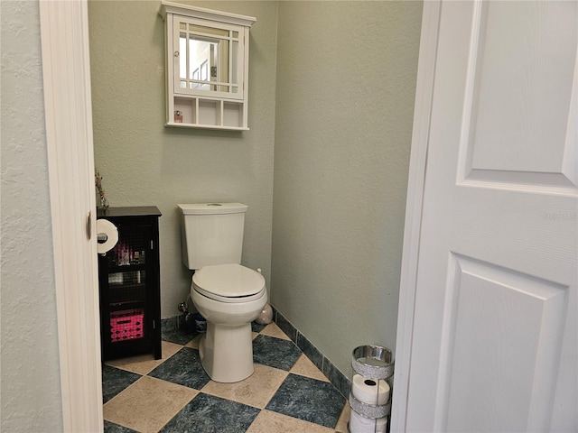 bathroom featuring toilet