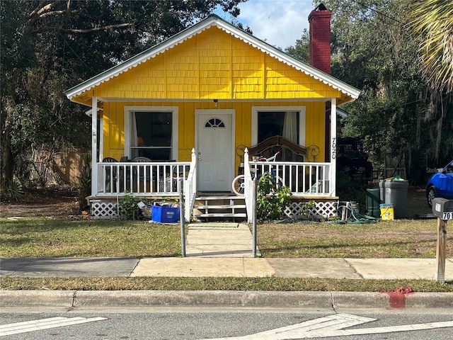 bungalow-style home featuring covered porch