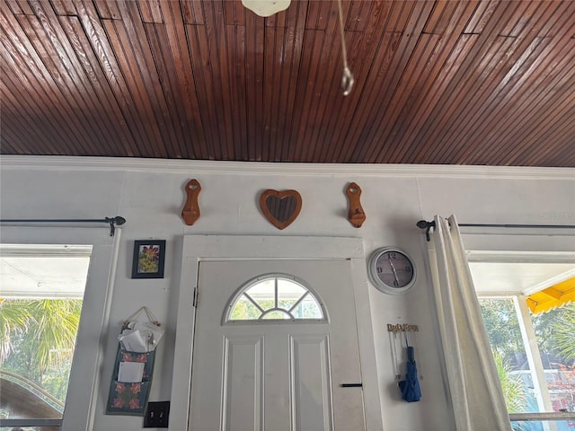 room details with wooden ceiling and crown molding