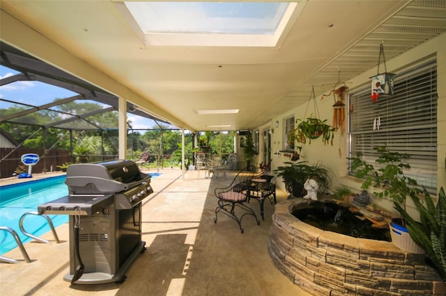 view of patio with area for grilling and glass enclosure