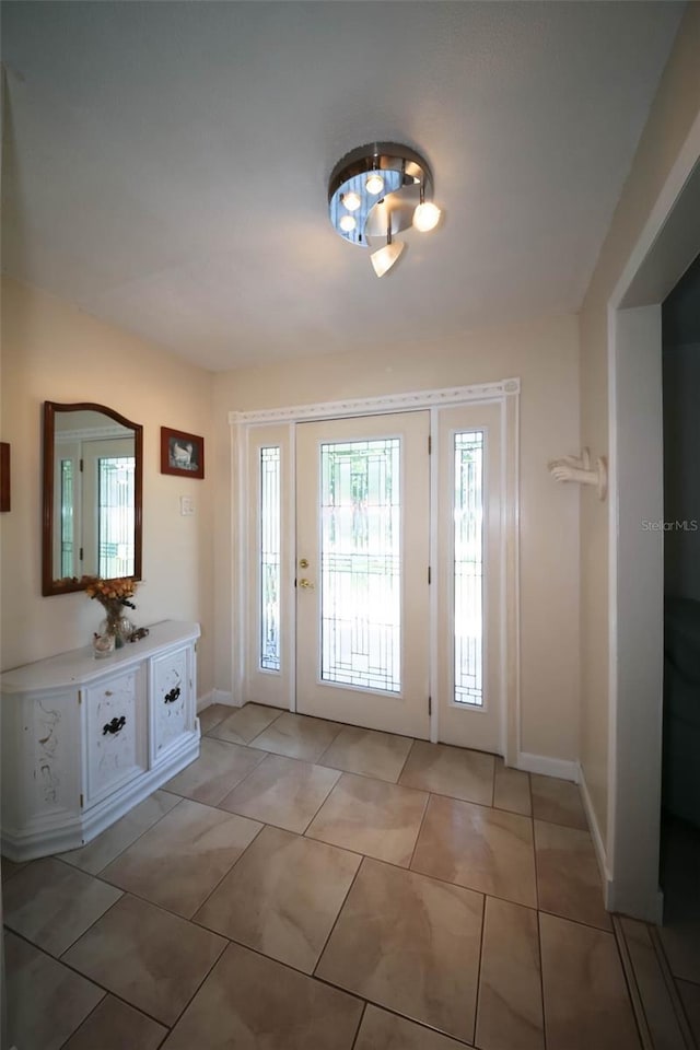 view of tiled entrance foyer