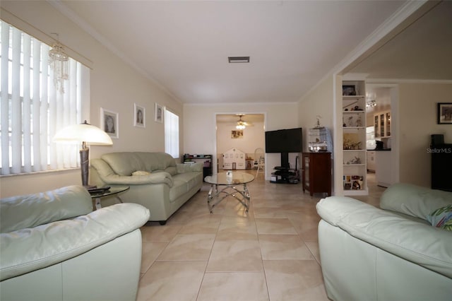 living room featuring ceiling fan, light tile patterned flooring, and ornamental molding