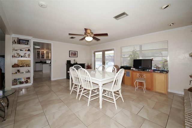 dining area with ceiling fan and light tile patterned floors