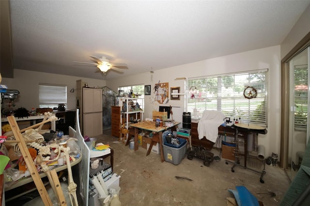 miscellaneous room with concrete floors and ceiling fan