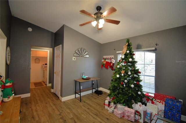 interior space featuring hardwood / wood-style floors and ceiling fan