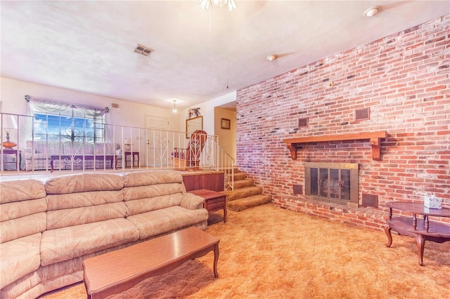 living room with carpet floors and a brick fireplace