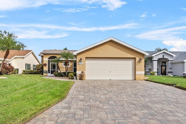 ranch-style house with a garage and a front yard