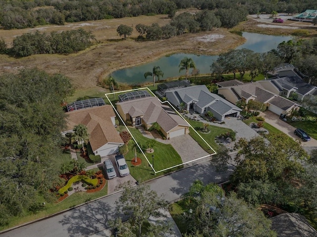 bird's eye view with a water view