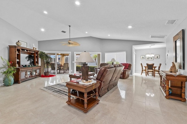 living room featuring a textured ceiling, ceiling fan with notable chandelier, vaulted ceiling, and light tile patterned flooring