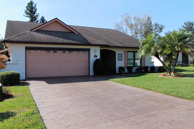 single story home with a front lawn and a garage