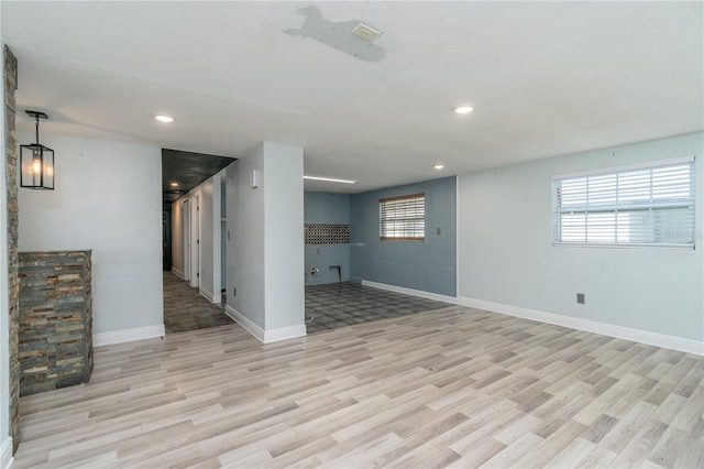 basement with light wood-type flooring