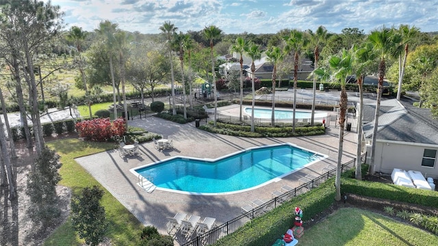 view of pool featuring a patio