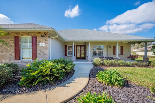 entrance to property with a porch