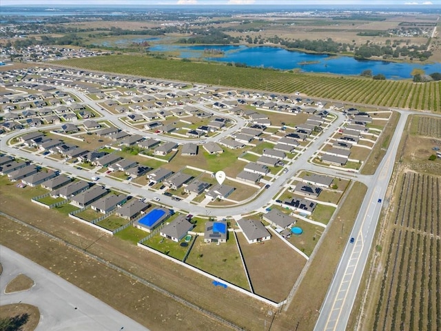 aerial view featuring a rural view and a water view