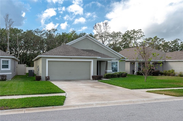 single story home featuring central AC, a front lawn, and a garage